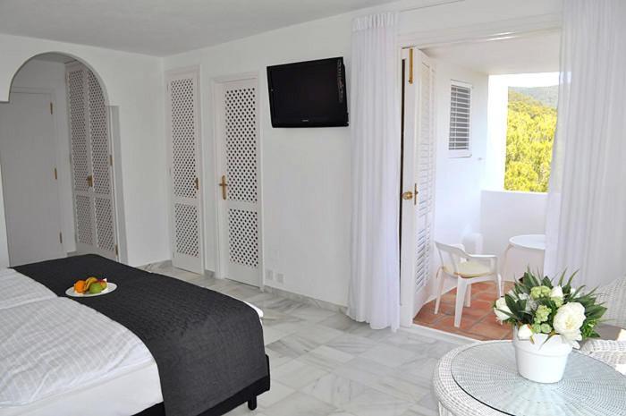 Hotel Village Cala Vadella  Rum bild